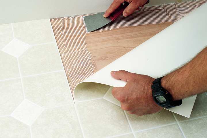 setting adhesive for vinyl sheet installation